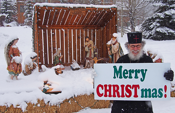 Brother Nathanael with Nativity Scene